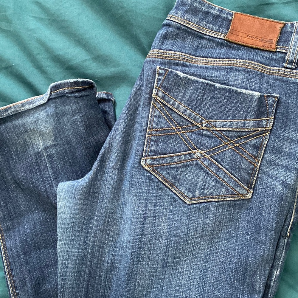 DKNY jeans medium wash distressed jeans